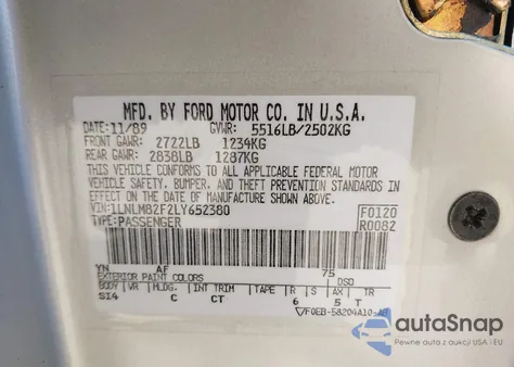 1990 Lincoln Town Car Signature z USA, uszkodzony, nr VIN 1LNLM82F2LY652380